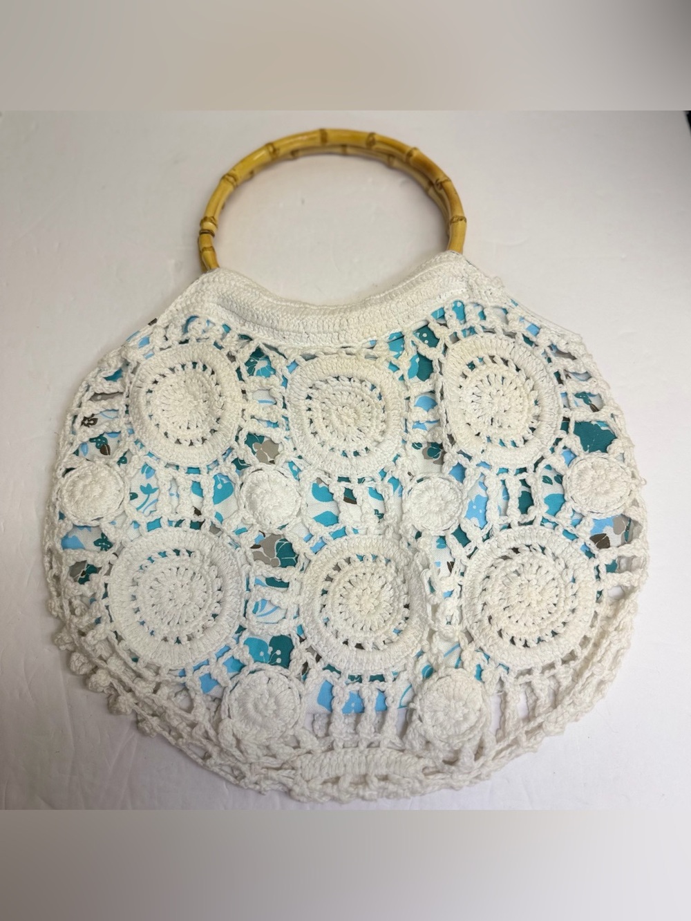 Lilu White Crochet Purse with teal and‎ gray floral underlay Bamboo Handles. - Picture 6 of 10